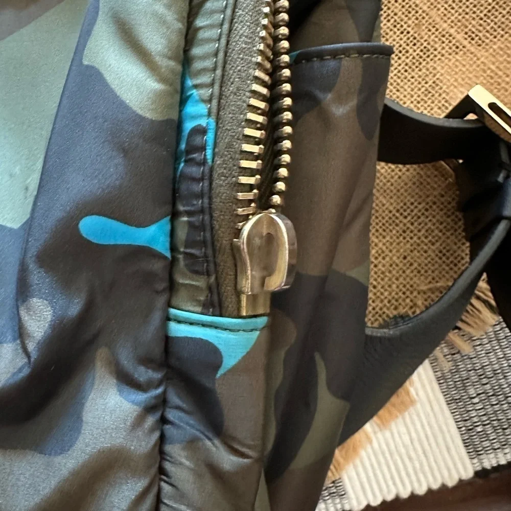 Valentino Garavani with COA nwot. Has hang tag and luggage tag. Unisex. Bookbag